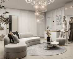 a living room filled with furniture and a chandelier