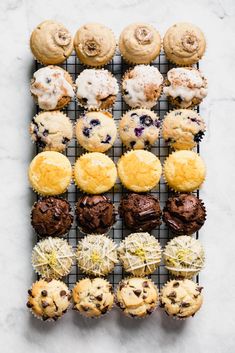 an overhead view of various pastries on a cooling rack