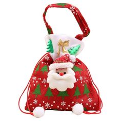 a red bag with a santa clause on the front and christmas decorations on the back