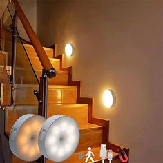 some lights that are sitting on the stairs