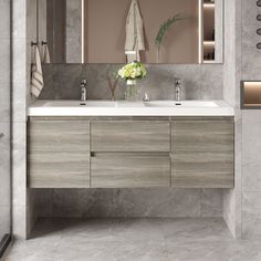 a bathroom with a sink, mirror and towel rack in it's center area