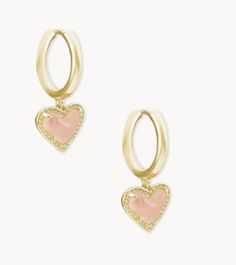 Hearts and huggies together - is there anything better? The Ari Heart Gold Huggie Earrings in Iridescent Drusy adds that little something extra to your look with its playful asymmetrical design. Metal 14k Gold Plated Over Brass Material Rose Quartz Closure Hinge Size 0.60” outside diameter, 0.43” L 0.40” W charm Please note: Due to the one-of-a-kind nature of the medium, exact colors and patterns may vary slightly from the image shown. Kendra Scott Earrings Hoops, Kendra Scott Heart Earrings, Fashion 23, Christmas Lists, Gold Huggie Earrings, Xmas Wishlist, Bday Gifts, Huggie Earrings Gold, Preppy Jewelry