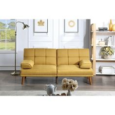 a living room scene with focus on the sofa