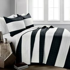 black and white bedding in a bedroom