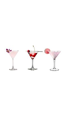 three different types of martinis on a white background