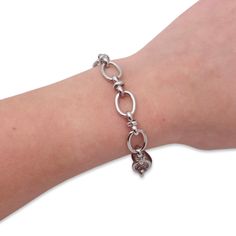 This chunky oval chain link bracelet is a bold, elegant design sizzling with high polish finish for an unforgettable effect! This is one you'll reach for over and over again, knowing that each time you wear it, you'll look fabulous! This bracelet features a lobster clasp that makes it easy to adjust to suit your wrist size and preferred styling. More Details:- Carefully Handmade- Stainless Steel - Anti-Tarnish- Thickness: 10 mm- Length: 20 cm- Metal Color: Silver, 18k Gold Adjustable Metal Chain Bracelet With Oval Link, Modern Oval Link Metal Bracelet, Modern Bracelets With Rolo Chain And Oval Link, Metal Paperclip Bracelet With Chunky Oval Link, Modern Metal Charm Bracelet With Extender, Elegant Metal Paperclip Bracelet With Oval Links, Modern Jubilee Chain Bracelet With Oval Links, Elegant Charm Bracelet With Chunky Oval Links, Trendy Oval Link Chain Bracelet For Formal Occasions