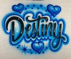 the word destiny is painted in blue and black