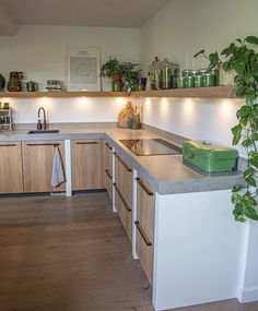 the kitchen is clean and ready for us to use in its new owner's home