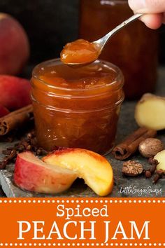 a spoon full of spiced peach jam with apples and cinnamon