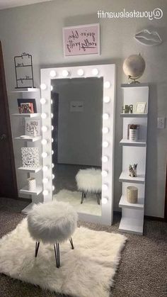 a room with a mirror, stool and lights