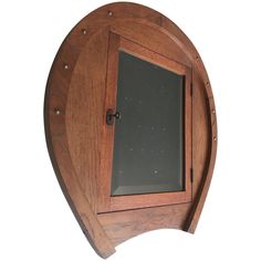 a wooden clock with glass in the middle