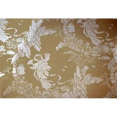 an image of a wallpaper with flowers and angels on it's gold background