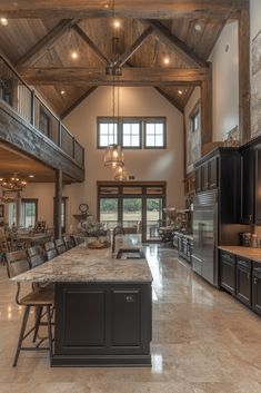 a large kitchen with an island in the middle and lots of counter space on each side