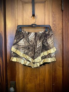 Part of my FLAWED/SAMPLE SALE! Rather than toss my old inventory, I'm offering them at a deep discount. These are non-returnable so please note that you are purchasing a FLAWED item or a SAMPLE item that has visible signs of wear from runway/photoshoot usage.  Specifically, these shorts have been worn on the runway. Shorty-shorts featuring golden ruffles.  Unisex style.  Looks great on any gender! Waist: XS: 26" S: 30" M: 34" L: 38" XL: 42" XXL: 46" 3XL: 50"   polyester/lycra fabric Sample Sale, Unisex Fashion, Ruffles, Short Outfits, Festival Season, Looks Great, Favorite Outfit, Gender Neutral, Art Collection