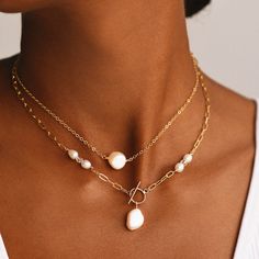 A truly one-of-a-kind necklace that blends the best of every classic together! This is a handmade symmetrical pearl and crystal bead necklace with a toggle clasp feature and teardrop pearl pendant to match. Pick between a paperclip or cable chain depending on your own personal style. Luxury Everyday Minimalist Toggle Necklace, Everyday Pearl Teardrop Necklace, Pearl Teardrop Necklace For Everyday, Teardrop Pearl Necklace For Everyday, Elegant Teardrop Charm Necklace With Lobster Clasp, Elegant White Charm Necklace With Paperclip Chain, Everyday Pearl Jewelry With Toggle Clasp, Elegant Teardrop Pendant Charm Necklace With Lobster Clasp, Everyday Pearl Drop Dangle Necklace