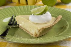 a slice of key lime pie on a green plate