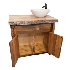 a bowl is sitting on top of a wooden sink cabinet that has drawers underneath it