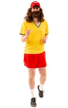 a man with long hair wearing a yellow shirt and red shorts