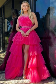 Let your inner beauty and style shine at prom with this stunning hot pink strapless dress! Adorned with feathered bodice and a beaded sash, the high-low tiered skirt will make you stand out from the crowd. Perfect for special occasions and making lasting memories.#prom#promdresses#promgown#formaldress#formaloutfit#seniorpromdress#promgown#blacktieeventdresses Prom Dress With Feathers, Hot Pink Prom, Hot Pink Prom Dress, Dress With Feathers, Feather Prom Dress, 90s Prom, Pink Evening Dress, Pink Prom Dress, Pink Formal Dresses