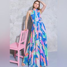 This Portrait Of A Lady On Woven Maxi Dress Is Crafted From Lightweight, Printed Woven Fabric That Moves Beautifully. It Has A High Halter Neckline With A Tie For A Secure Fit, Is Sleeveless For Maximum Mobility And A Back Smocked Waist Band For Added Comfort. This Sophisticated Design Is Sure To Be A Wardrobe Favorite. Details - Self: 100% Polyester - Lining: 100% Polyester Size & Fit - Model Is 5`8 " And Wearing Size Small - Measurements Taken From Size Small - Approx. Length: 62” Nwot - Never Unique Maxi Dress Designs, Sunlit Spring, Clothes Wardrobe, Visor Hairstyles, Dress Book, Halter Neck Maxi Dress, Knitted Swimsuit, Abstract Dress, Color Wow