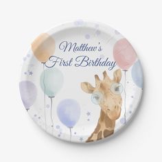 a paper plate with a giraffe and balloons on it