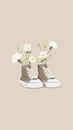 a pair of sneakers with flowers in them