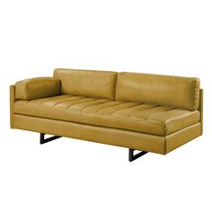 a tan leather couch sitting on top of a metal frame