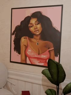 a painting of a woman in a pink dress hangs on the wall next to a potted plant