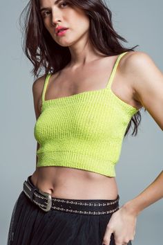 Introducing our "Lime Zest" Crop Top, a vibrant and stylish addition to your summer wardrobe. This lime green beauty with spaghetti straps is perfect for warm days, offering a refreshing look that pairs effortlessly with a white skirt for a chic ensemble.  The cropped length and sleeveless style make it an ideal choice for sunny days, providing a cool and comfortable feel. The bodycon fit adds a touch of allure, creating a silhouette that's both flattering and trendy.  Crafted from 100% Polyester with a fine knit, this top ensures a lightweight and breathable experience, making it suitable for your daily activities. Whether you're heading out for a casual day or pairing it with a white skirt for a more polished look, the "Lime Zest" Crop Top is versatile and stylish.  The model, showcasing Vacation Tank Top With Adjustable Spaghetti Straps, Vacation Spaghetti Straps Tank Top With Adjustable Straps, Chic Spaghetti Strap Tank Top For Beach Season, Trendy Summer Camisole, Summer Beachwear Camisole Tank Top, Summer Beach Tank Top With Straps, Summer Spaghetti Strap Tank Top For Vacation, Summer Spaghetti Straps Tank Top For Vacation, Summer Camisole With Adjustable Straps