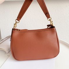 Coach C’s new women’s bag CARY crossbody bag cc438. 435 437 solid color. The brown solid color has a high-end feel, it looks a bit like a mahjong bag, coa*h cary soft European bag, a soft armpit bag, with long and short double shoulder straps that can be adjusted to switch to various styles, and the neat zipper is easy to open and close for daily use. The interior space is large, making daily storage and use stress-free! ! Simple bag design with exquisite tanned leather craftsmanship details, low-key connotation, fashionable and practical Jimei! Chong Chong Oil Duck~Material: Cowhide/PVC Leather

Size: 28×18.5×11.5 (cm) Brown Solid Color, Music Bag, Simple Bag, Multifunction Bag, Orange Backpacks, Armpit Bag, Lv Purse, Lv Shoes, Mini Bucket Bags