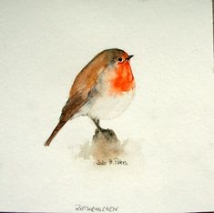 a watercolor painting of a bird sitting on top of a piece of white paper