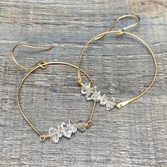 14/20 Gold Filled (GF), Herkimer diamonds Hand formed gold hoop. Size option - 1" or 1 and 1/2" diameter 3 or 5 brilliant Herkimer diamonds gold gemsbar embellished the hoop bottom Hand formed GF ear wires. Hoop hangs 2 and 1/2” or 1 and 3/4" total from ear lobe Be sure to check out companion necklace - Gembar and Embrace Add light and sparkles to your day Each jewelry piece is hand fabricated with love and care in my Montana studio Made to order. Normal processing time is 3 to 5 working days. Work Jewelry, Diamonds And Gold, Diamond Hoop Earrings, Herkimer Diamond, Gold Hoop, Ear Wires, Alex And Ani Charm Bracelet, Jewelry Pieces, Gold Filled