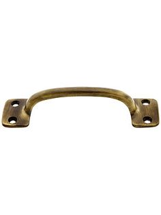 an antique brass door handle on a white background