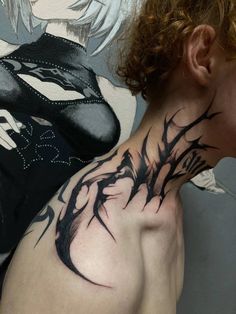 a woman with a tattoo on her neck