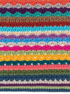 multicolored crocheted blanket with white background