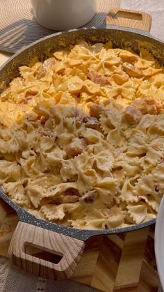 a casserole dish with pasta and meat in it