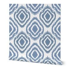 a blue and white wallpaper with an abstract design on the front, in shades of grey