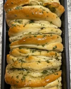 bread with cheese and herbs in a baking pan