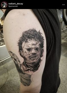 a man's arm with a tattoo of a scary clown on the inside of it