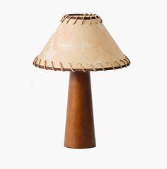 a wooden table lamp on a white background