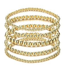 PRICES MAY VARY. This metal gold stackable beaded bracelet is a traditional, elegant design sizzling with high polish finish for an unforgettable effect! Each time you wear it, you'll look fabulous! Gold color bead bracelet for layering.The sweet bracelet looks elegant on its own but will also add a splash of sparkle to your favorite stack. Our gold stackabe bead bracelets is so much fun to purchase as individual bracelets available in 4mm,5mm or 6mm 8 mm bead sizes. when worn alone or several a Preppy 12th Birthday, Beads Bracelet Stack, Gold Beads Bracelet, Christmas Wishlist Ideas, String Friendship Bracelets, Stackable Beaded Bracelets, Gold Bracelets Stacked, Bday List, Birthday Things