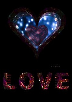 the word love is written in front of a heart shaped object with lights on it