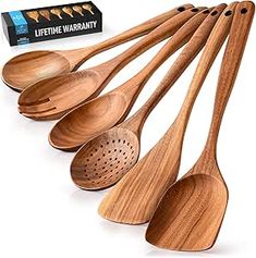 six wooden spoons lined up next to each other