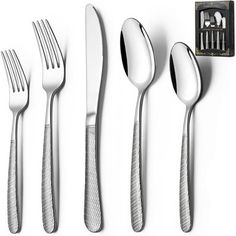 four forks, two knives and three spoons on a white surface with a black box