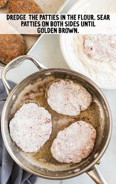 some meat patties are cooking in a pan on the stove and then covered with powdered sugar