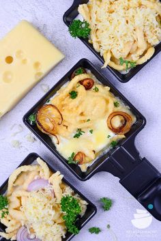 four plastic trays filled with different types of food next to cheese and broccoli