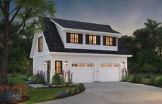 a white two story house with three windows on the top floor and an attached garage