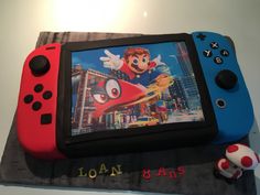 a cake made to look like an nintendo wii game console