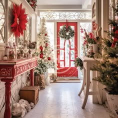 a christmas decorated hallway with red and white decorations