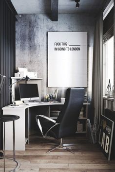 an office with a desk, chair and computer